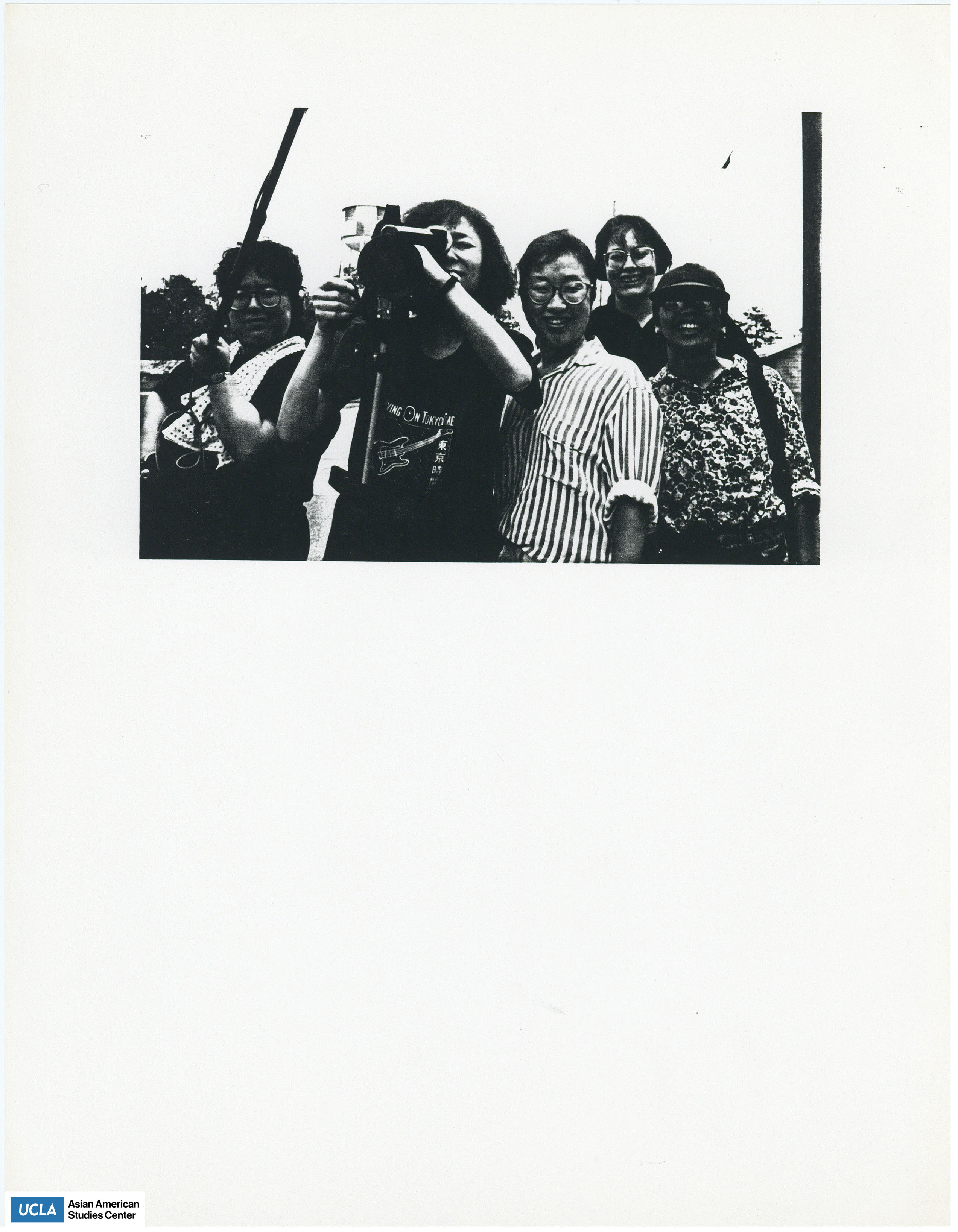Black and white photograph of a film crew of five women.