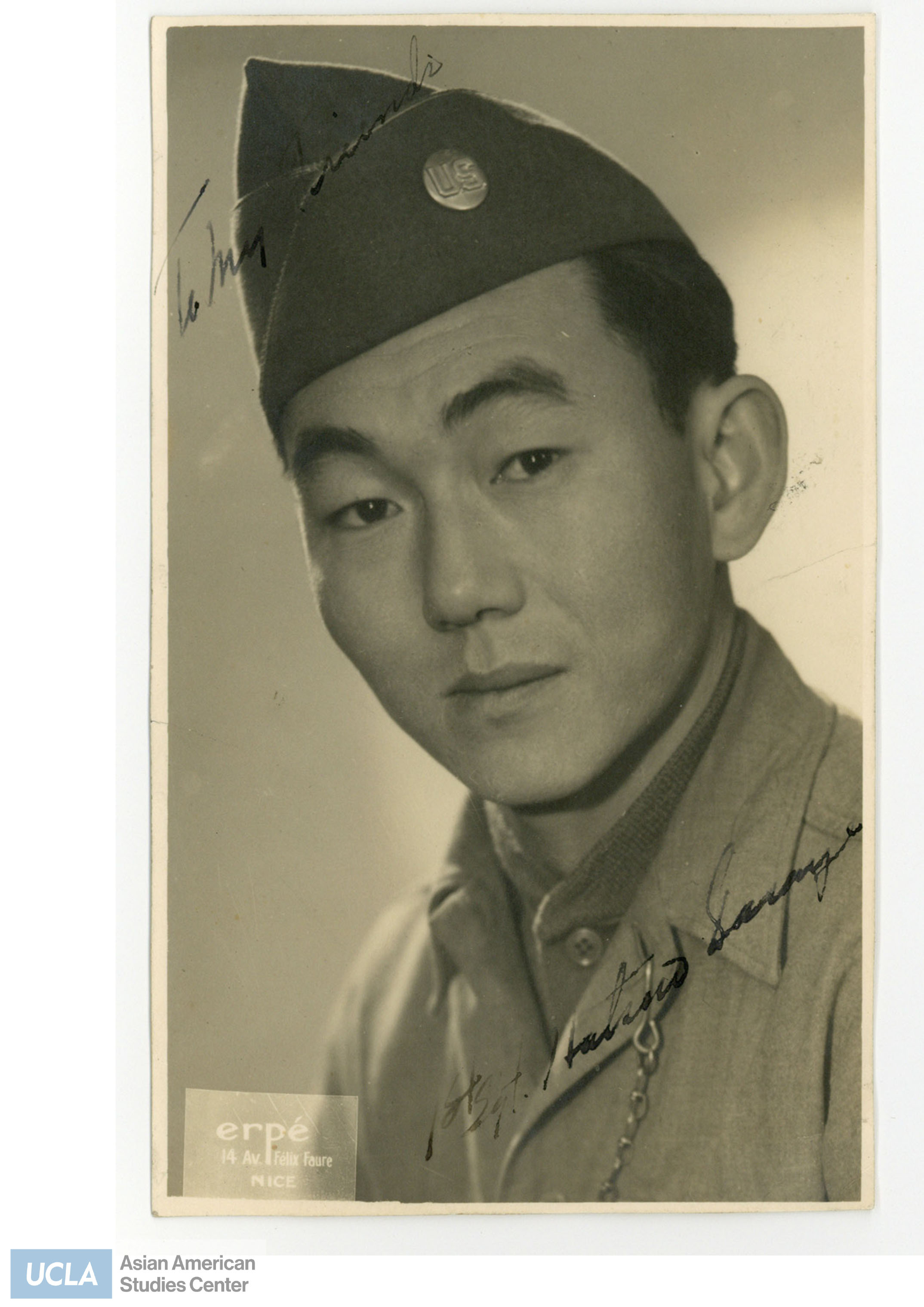 Portrait of Hatsuno, a Nisei serviceman in uniform. Back of photo text includes: 