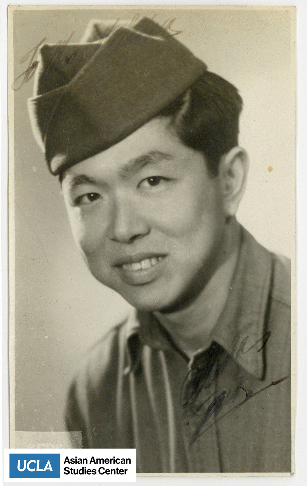 Nisei man in military uniform.