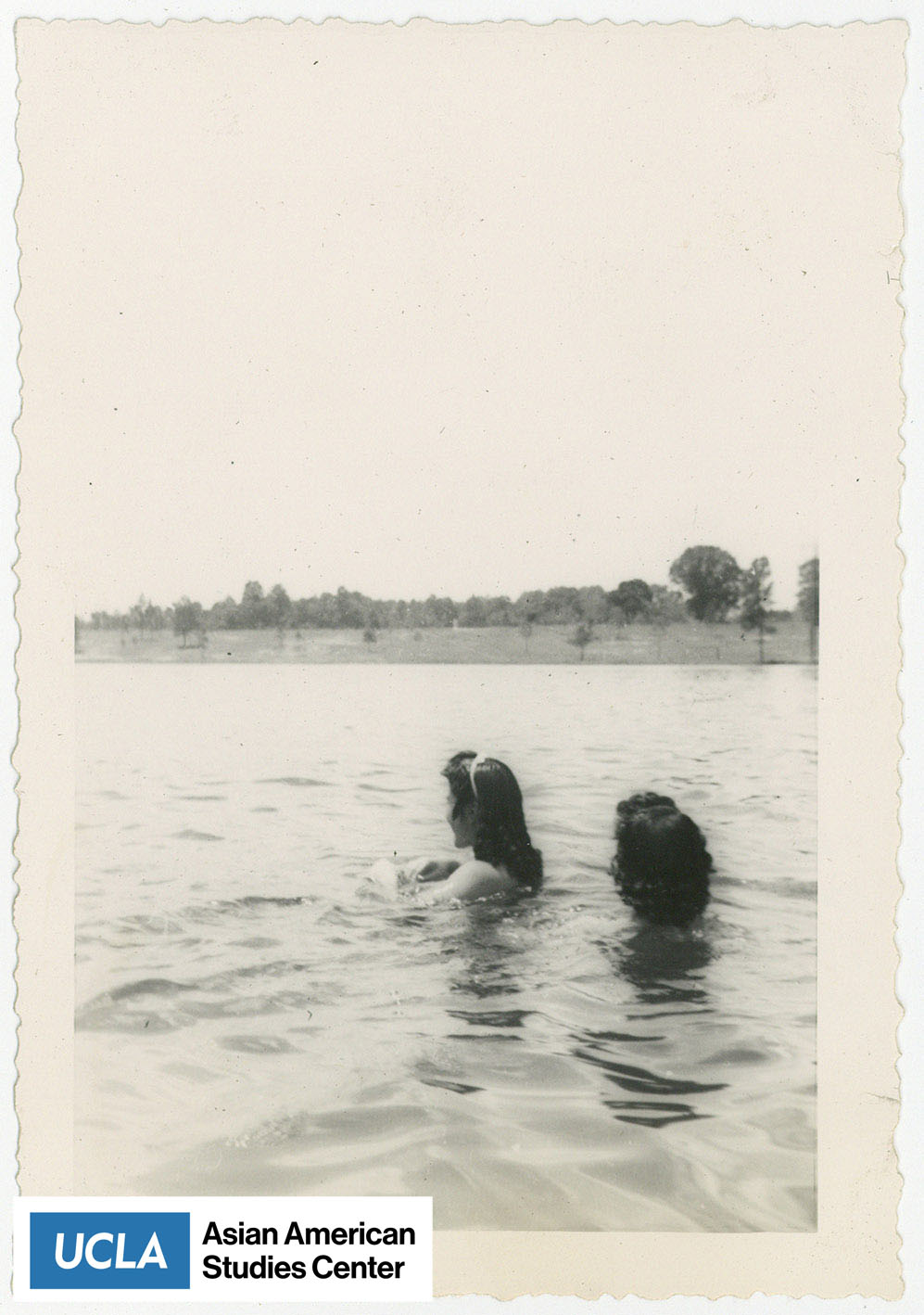 Two Nisei women swimming.