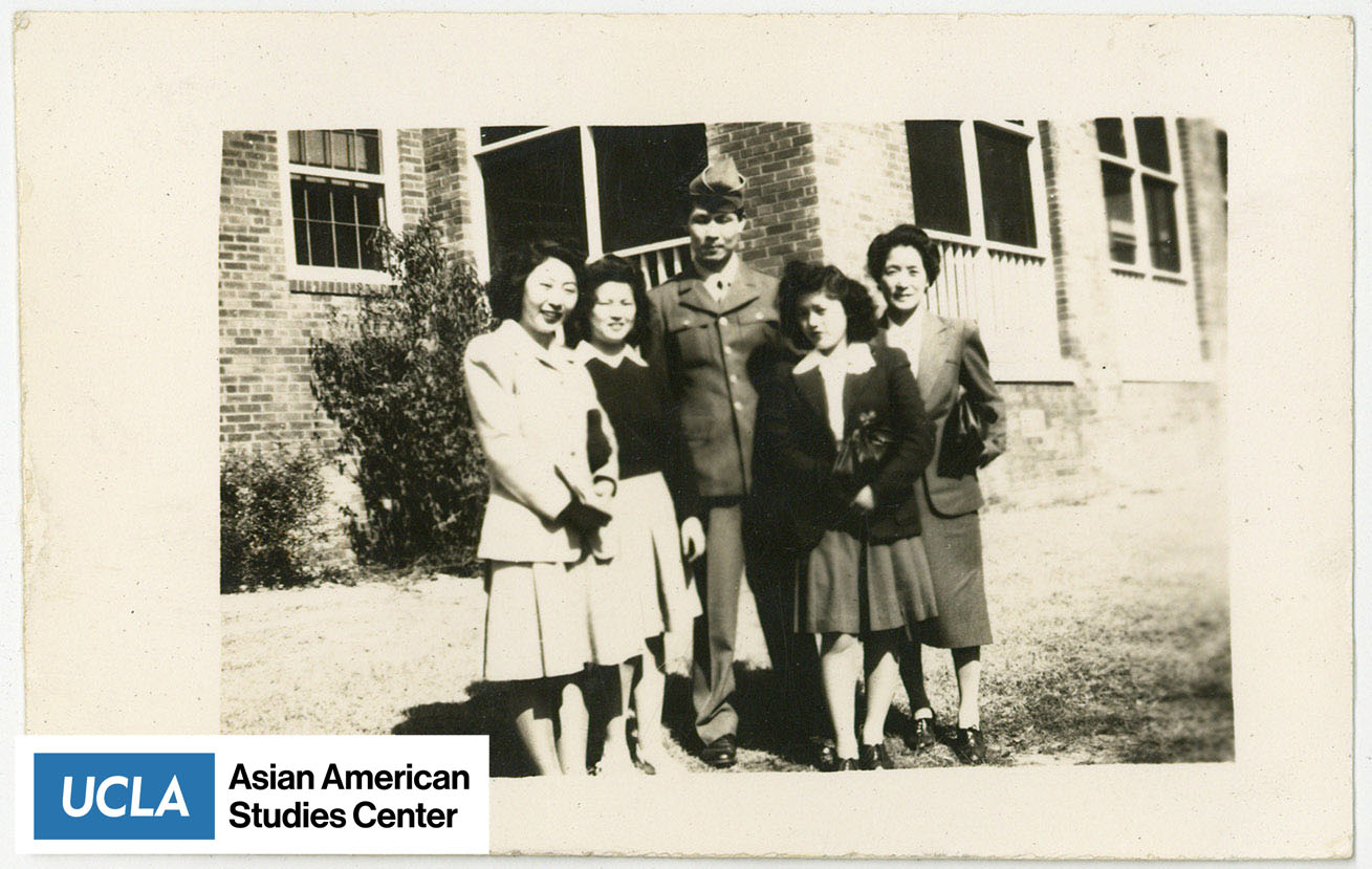 Tsuma Nakahara stands on the far right side of the group.