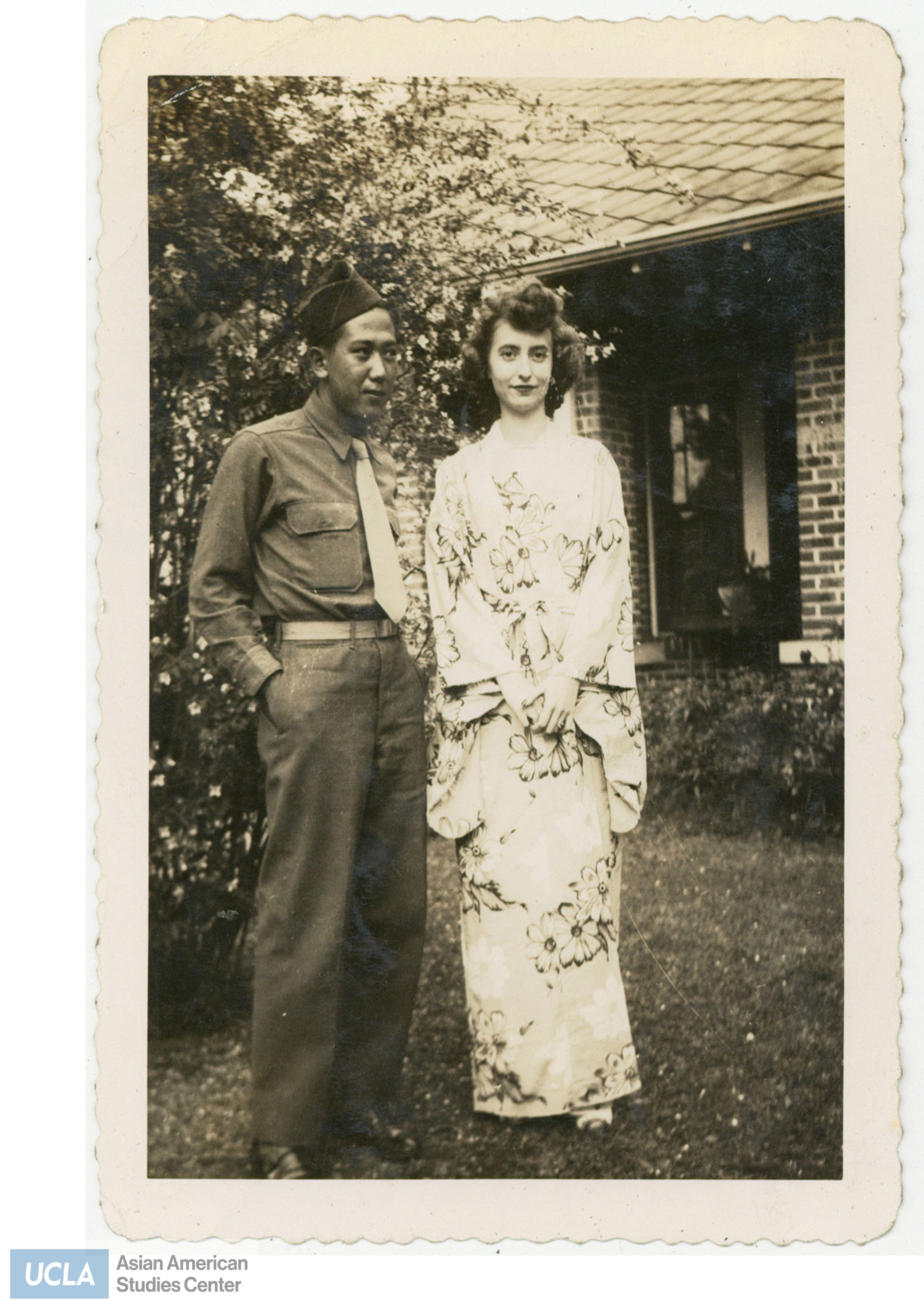 Nisei solider and a woman wearing a kimono. Back of photo of Fannie Haughton's address.