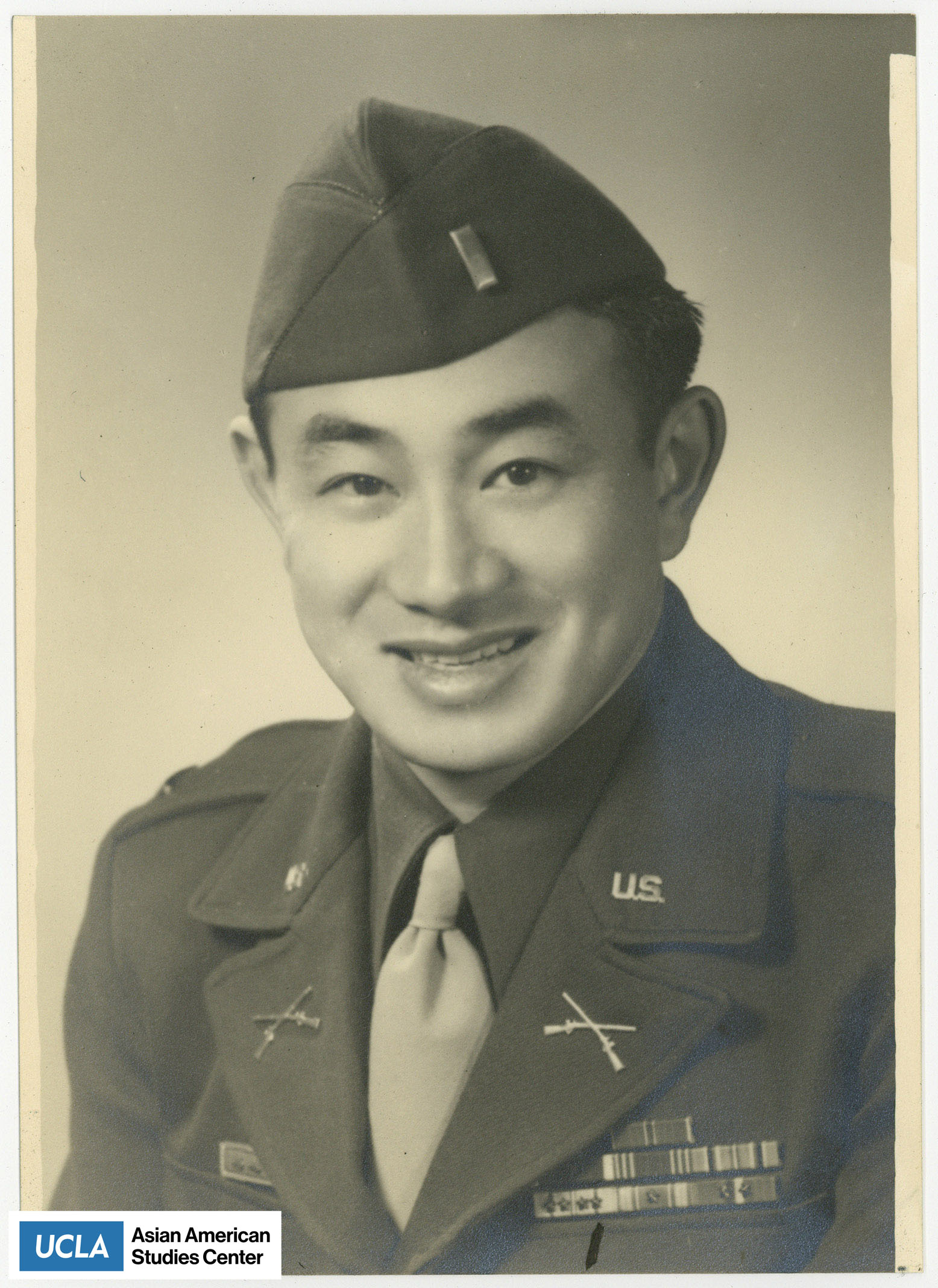 Nisei serviceman in uniform.