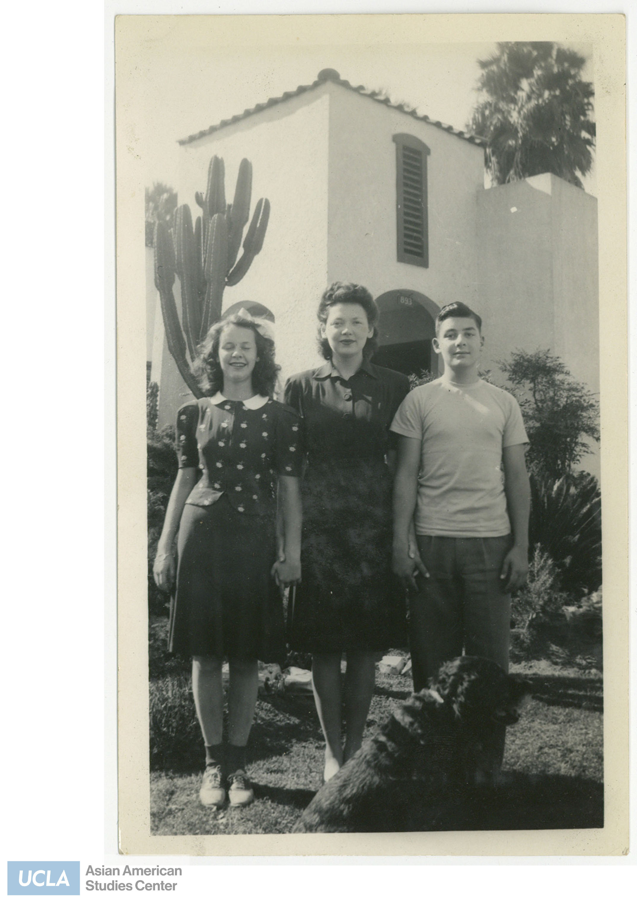 Family photo of the Mitchells. The Mitchells were tenants of the Nakahara's home during the detainment of Japanese Americans. Back of photo includes names of tenants.
