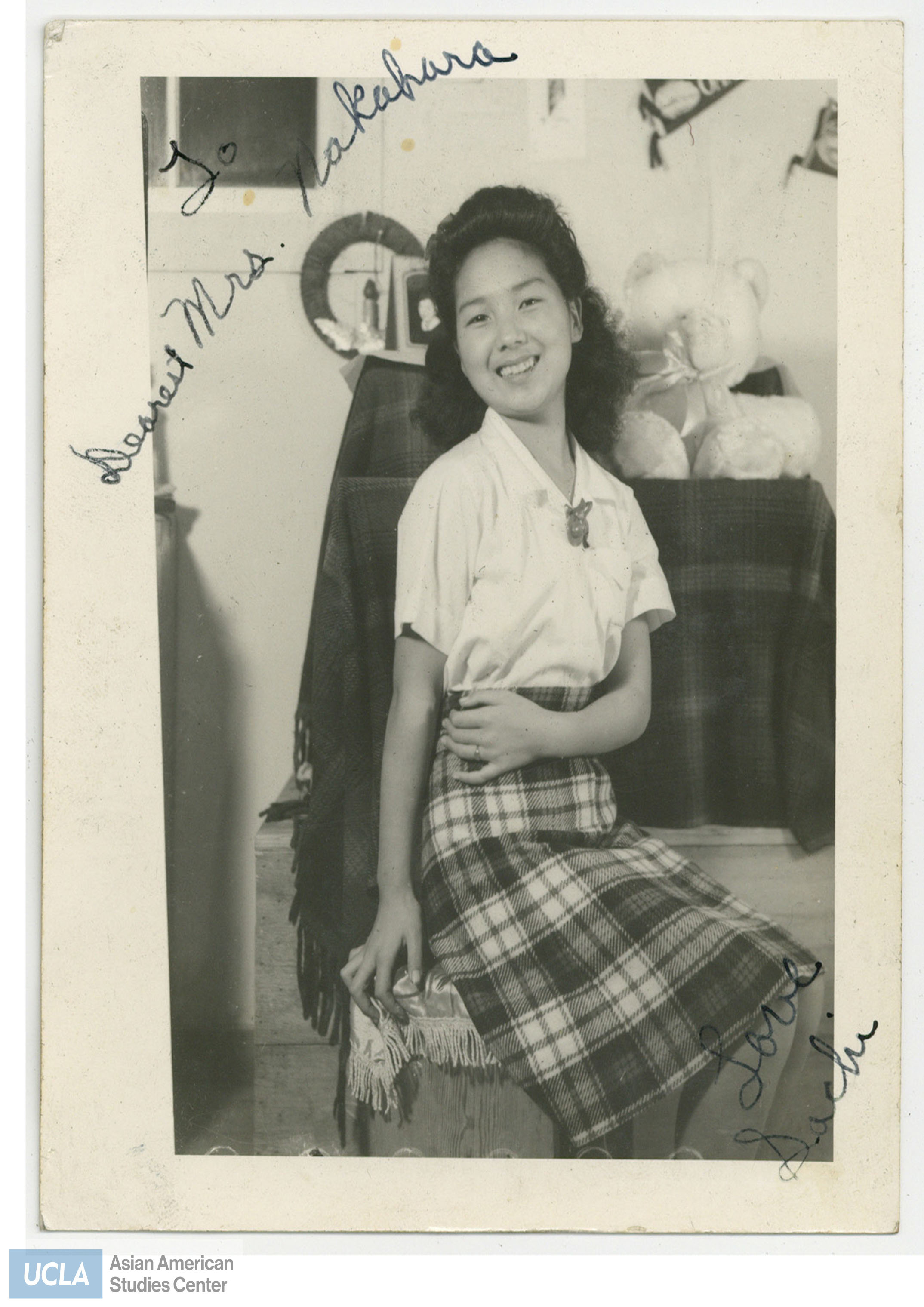 Picture  of Sachi taken in Rohwer War Relocation Center. Back of photo includes text: 