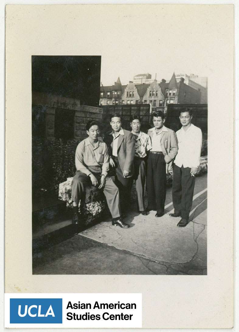 Five Nisei men pose for a photograph.