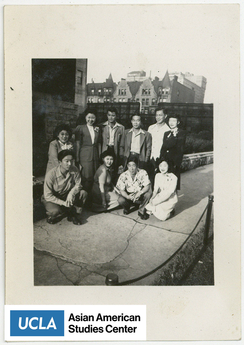 Group of ten Nisei pose for a photograph.