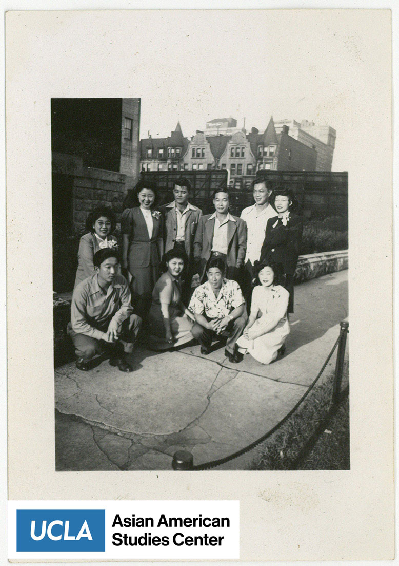 Group of ten Nisei pose for a photograph.
