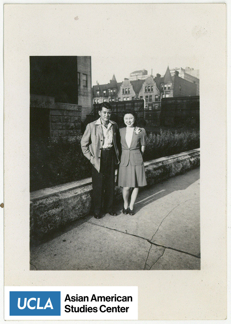 Nisei couple pose for a photograph.