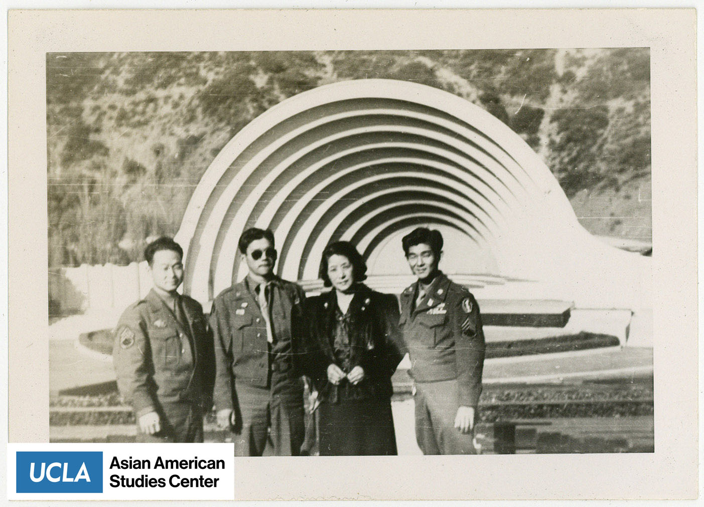 Tsuma Narahara and two Nisei men with Haru to the right of her.