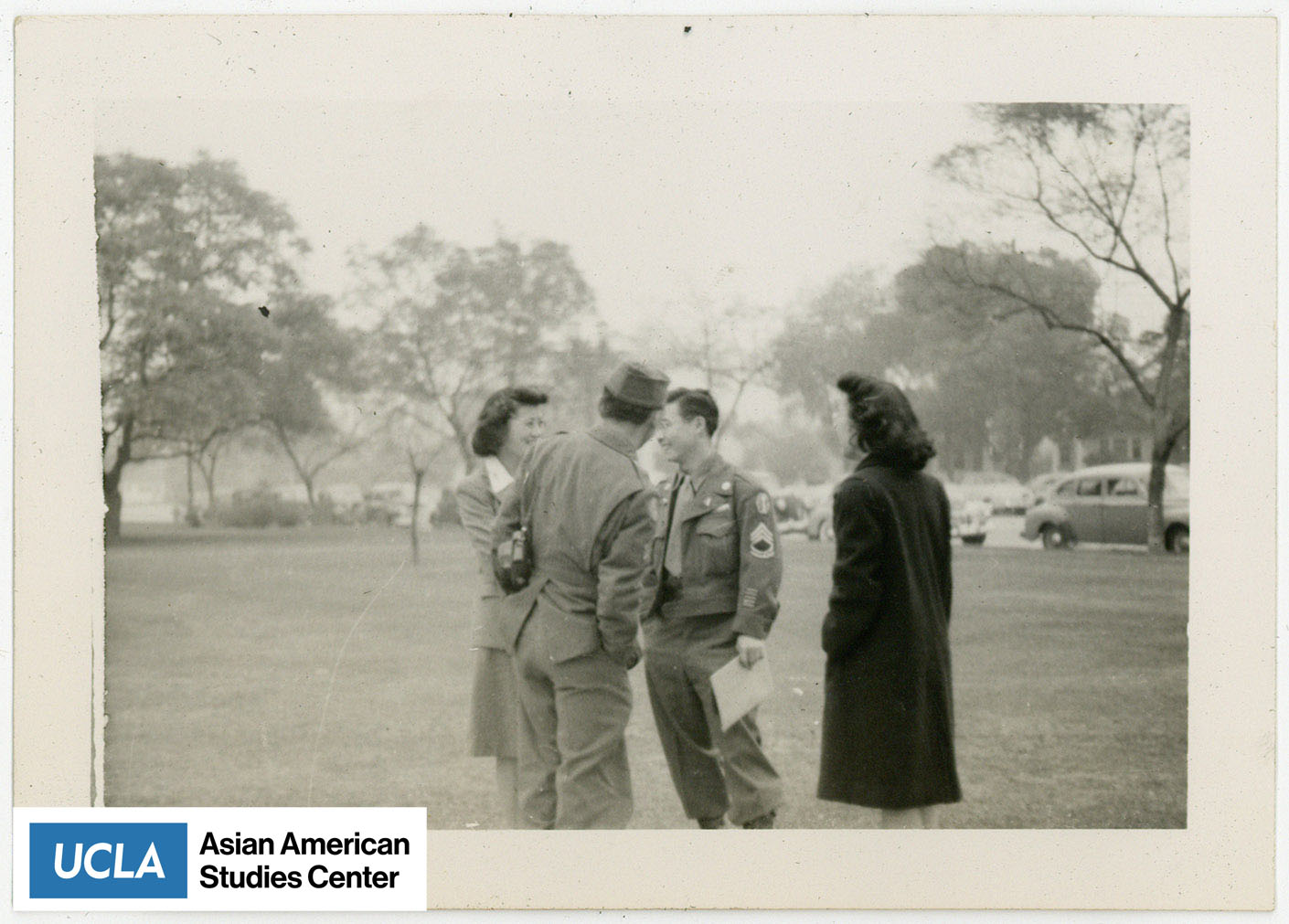 Young Nisei gathered in a circile with Yuri and Arthur.
