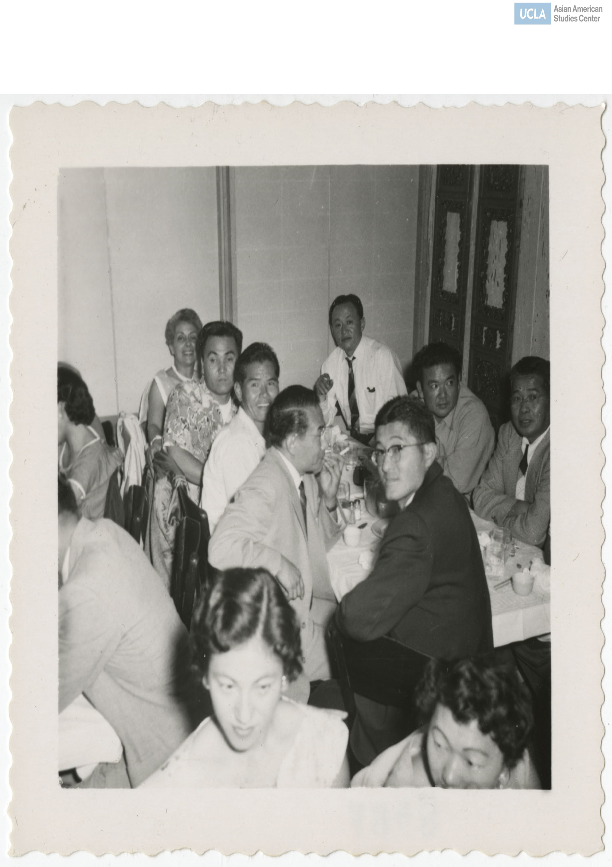 Company K veterans seated around a table.