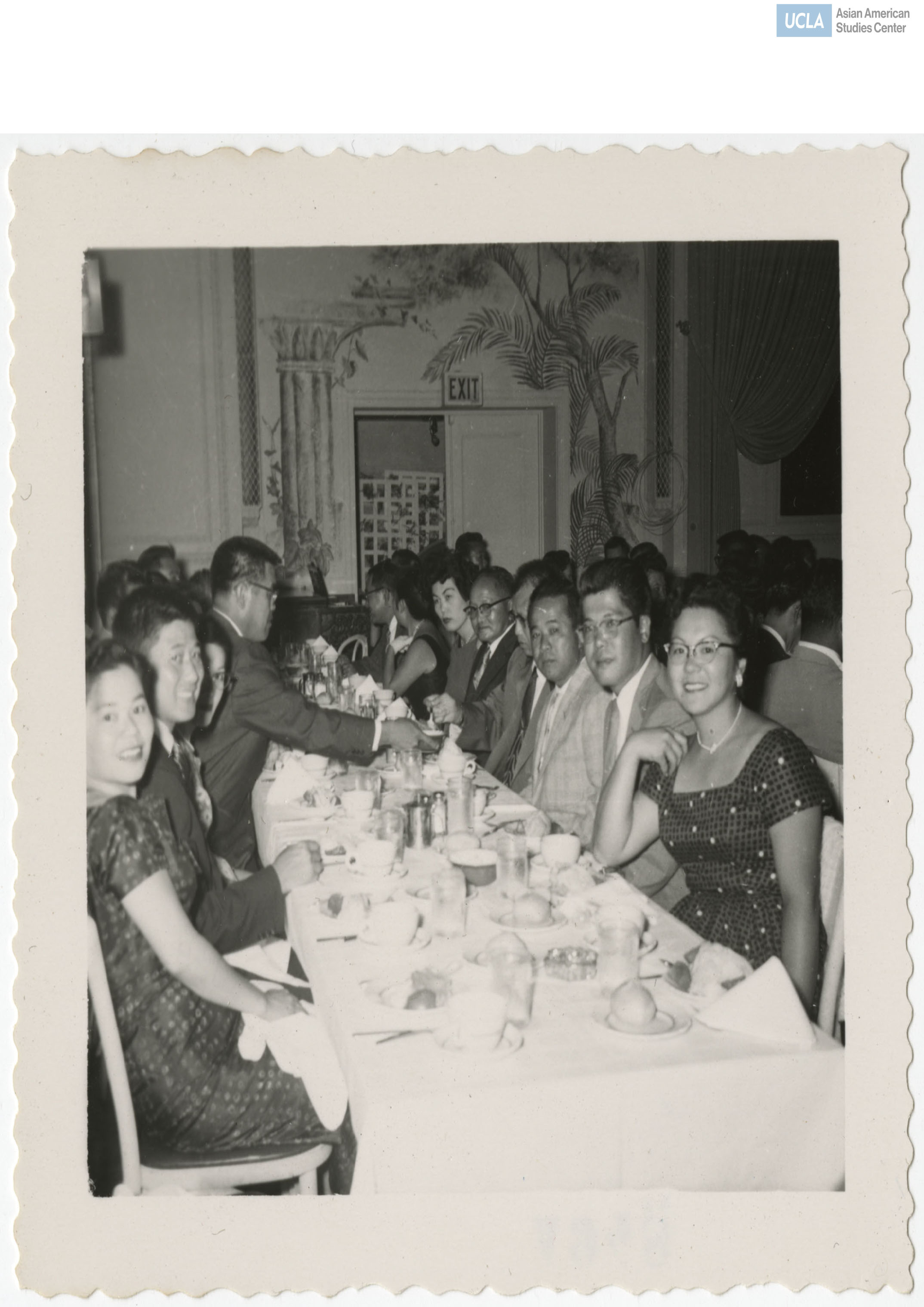 Company K reunion of the 442nd Regimental Combat Team posing for a photograph. Lilly Tokiwa is seated on the lower right.
