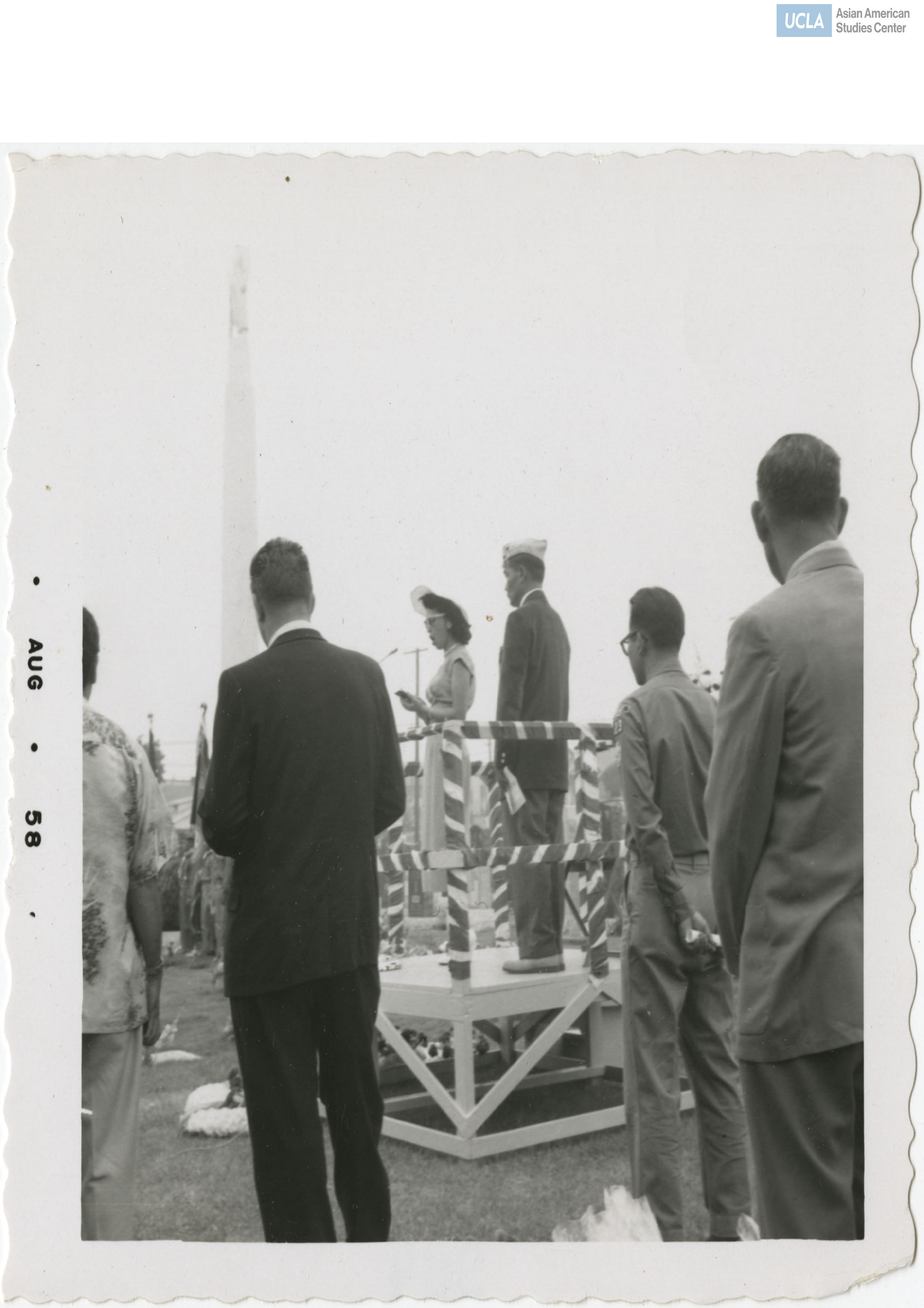 A woman speaking to crowd during the Nisei Veterans of Foreign Wars reunion.