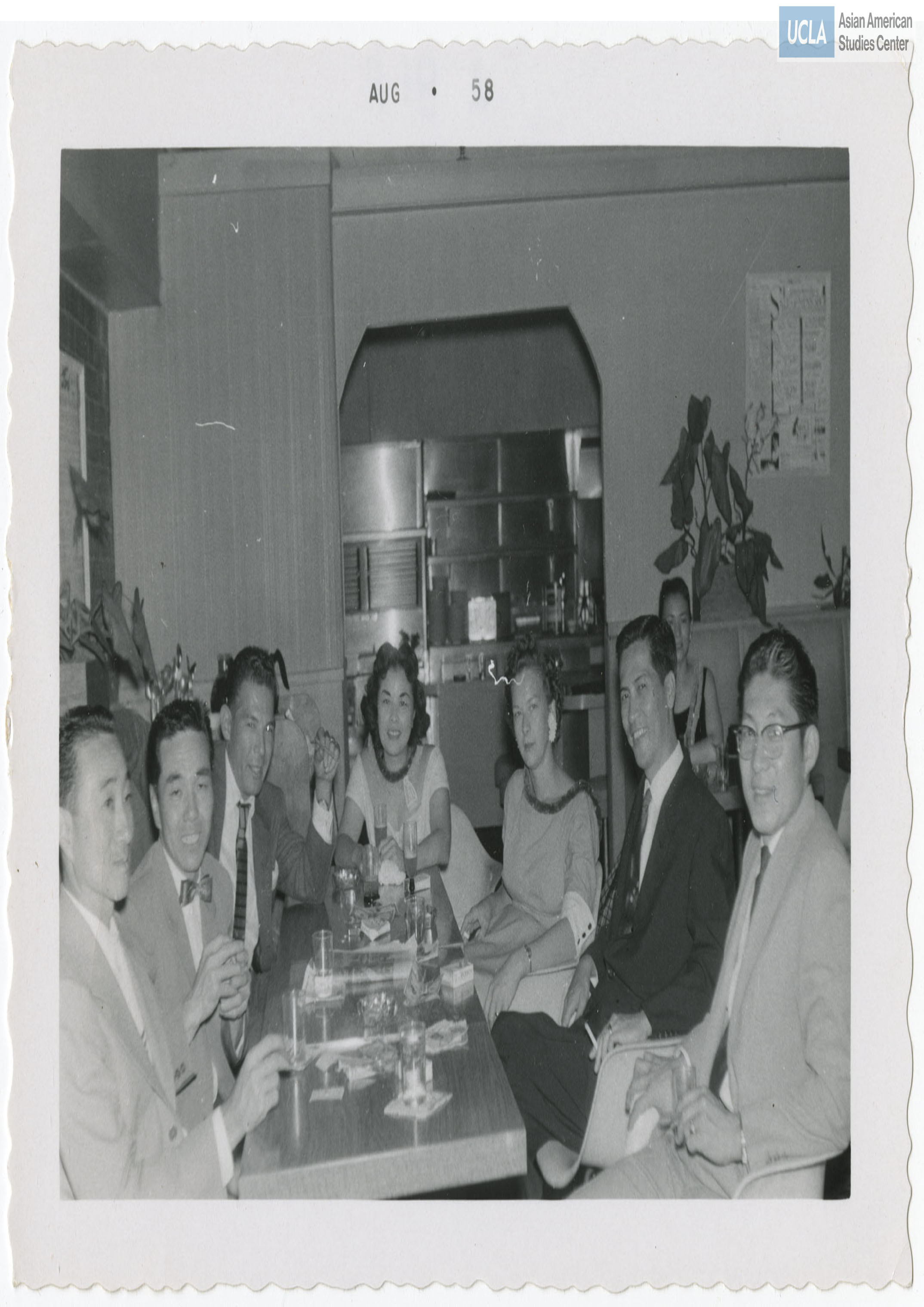Nisei Veterans of Foreign Wars members smile for a photograph